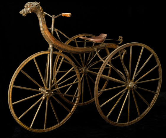Velocipede Tricycle, 1867-8<br>
Michaux & Cie., Paris<br>
France<p>

This spectacular carved Chinese dragon velocipede, manufactured by the most important maker of velocipedes, was featured at the first bicycle history exhibition: the Exposition Rétrospective du Cycle at the Grand Palais in Paris, 1907.